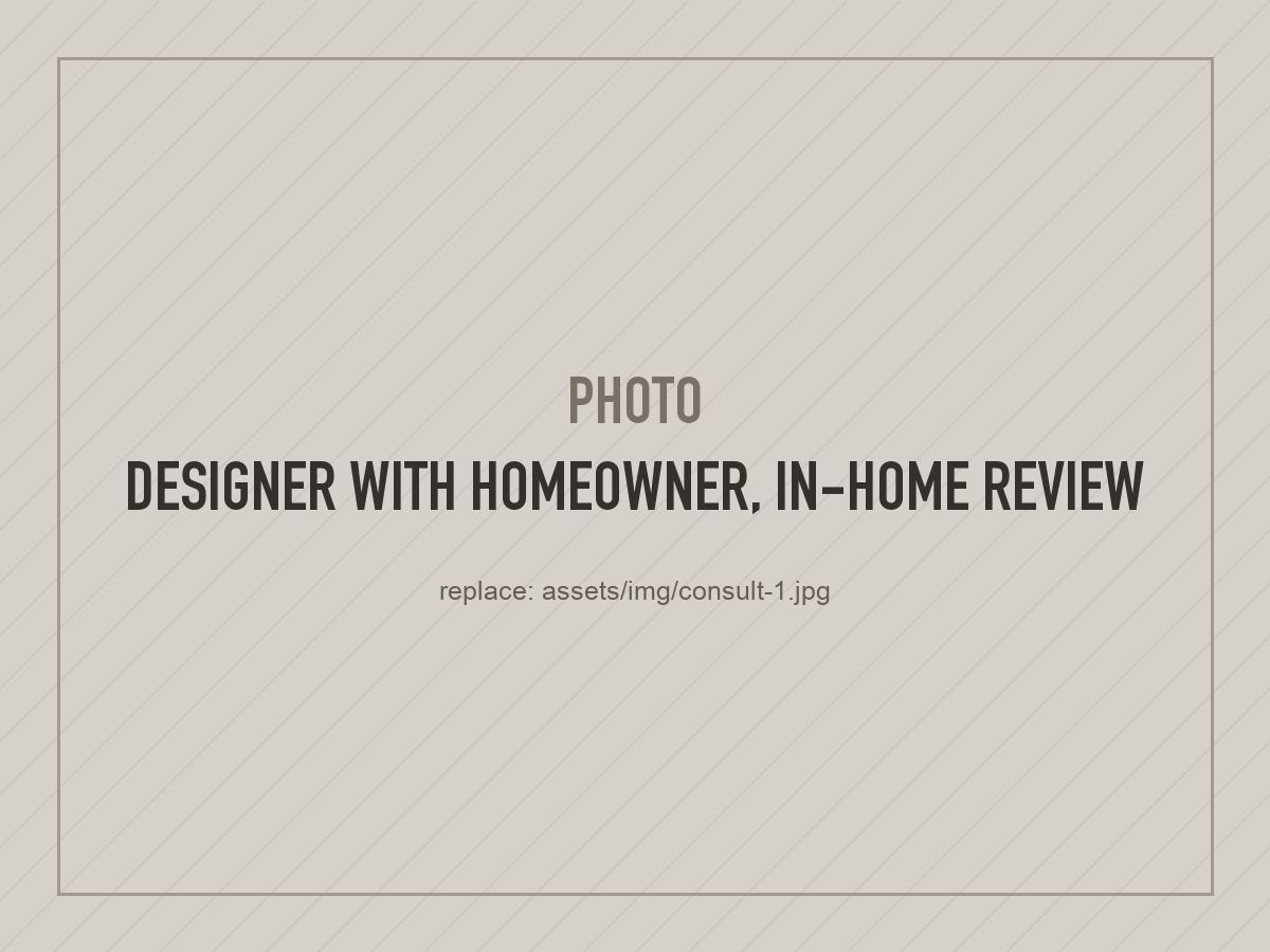 Placeholder photo: designer reviewing the space with a homeowner in their home
